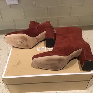 Michael Kors Ursula Boot with shinny metallic accent chunky block heel.